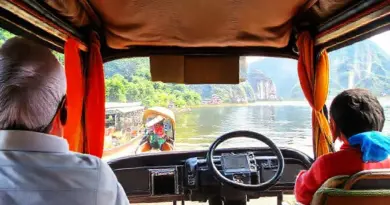 How to get there and navigate locally — transport options, guided tours vs independent travel, and day-trip logistics from Luang Prabang